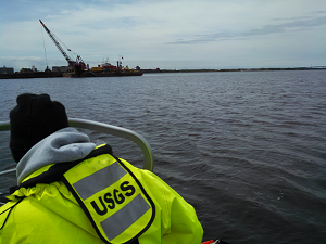 Sampling during placement of dredge material in the 21st Avenue West Channel Embayment of the Duluth-Superior Harbor.