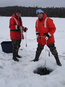 Jeff Ziegeweid and Andrew Berg collecting lake samples.