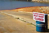 Picture of a boat ramp closed because drought has lowered the level of a lake. Photo by Alan Hope