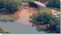 Picture showing sediment inflow from a tributary to a larger river. 