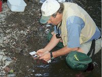 Scientist taking sample.