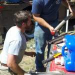 Drillers, John Greene and Brent Mason processing a split-spoon core during the 2012 Field Session