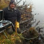 Brent Mason pumping a mini-piezometer for a surface-water, groundwater interaction study in October 2012