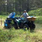 Student, Zach Hillman collecting field parameters at a well during the 2012 Field Session