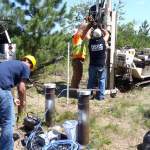 Ean samples a well; Brent and Jim installing well screens with the geoprobe